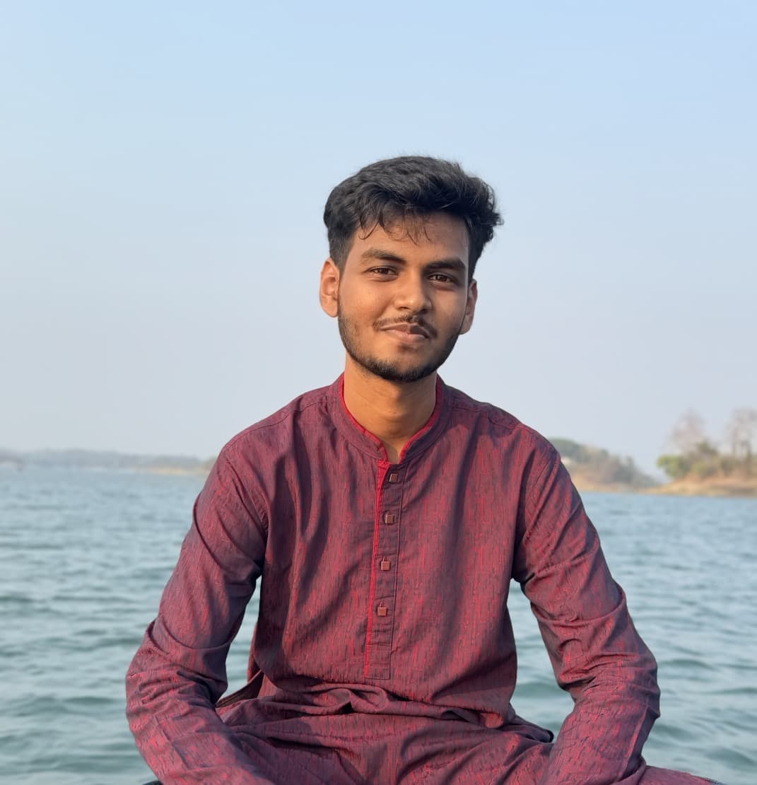 Mahdi Al Hasan outdoors by the water